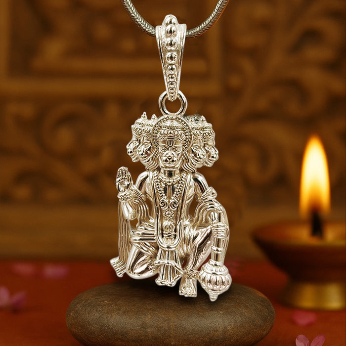 Unniyarcha silver necklace with bold traditional design and layered detailing, photographed on neutral fabric for texture