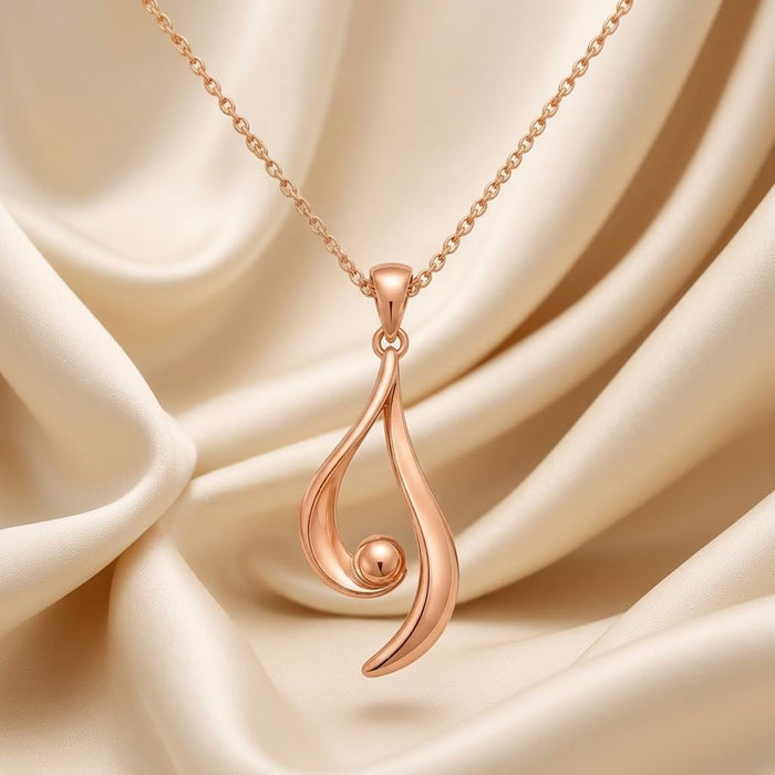 Rose Gold Plated Asymmetrical Aura Pendant on ivory satin with polished round bead detail
