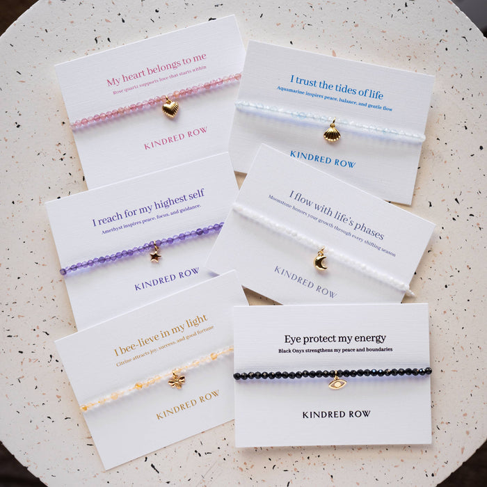 black onyx evil eye affirmation charm bracelet