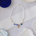 Blue and White Cross Charm Bracelet