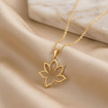 Silent Bloom Pendant with an openwork seven-petal floral outline on champagne satin