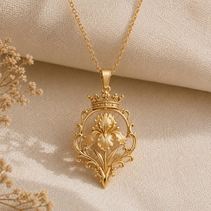 Gold Plated Silver Noble Iris Throne Necklace with crowned iris pendant on ivory textured fabric