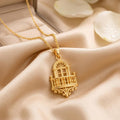 Gold Plated Silver Royal Balcony Pendant Necklace on champagne satin beside pale petals
