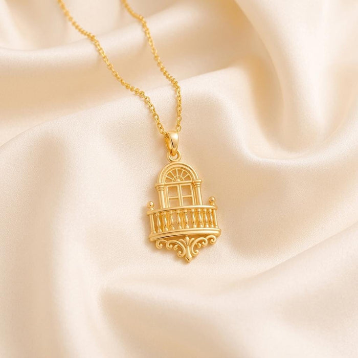 Close view of Gold Plated Silver Royal Balcony Pendant Necklace on champagne satin