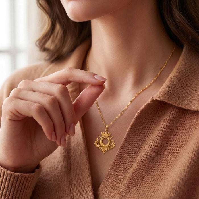 Model wearing the Gold Plated Silver Royal Eclipse Tiara Pendant with a brown knit cardigan