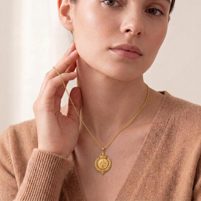Front portrait of a woman wearing the Gold Plated Silver Royal Laurel Sigil Pendant