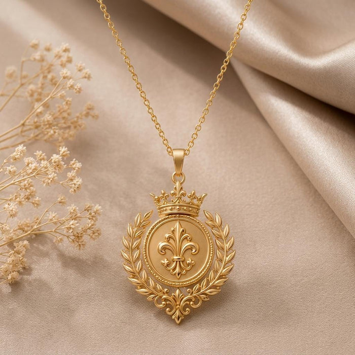 Close-up of the Gold Plated Silver Royal Laurel Sigil Pendant showing the crown, fleur-de-lis, laurel branches, and lower scrollwork