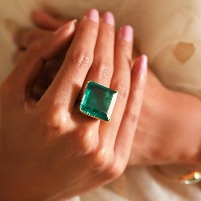 Square-cut green gemstone ring in 92.5 sterling silver with bold, modern design