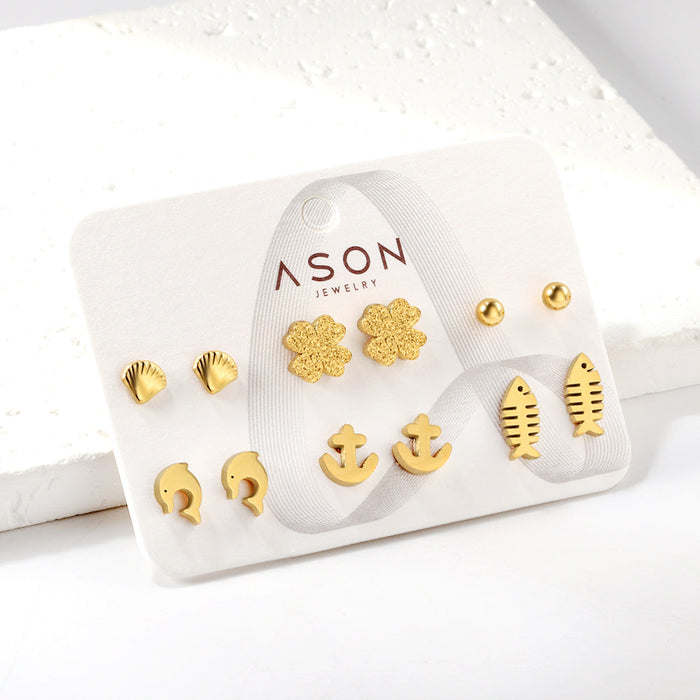Six pairs of mixed card mounted cut-out shell / fishbone / dolphin stud earrings gold color asonjewelry