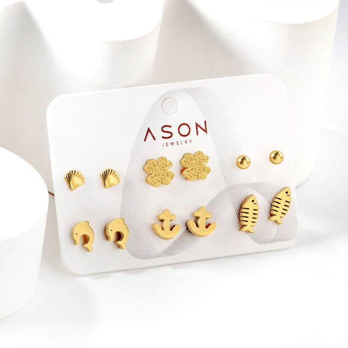 Six pairs of mixed card mounted cut-out shell / fishbone / dolphin stud earrings gold color asonjewelry