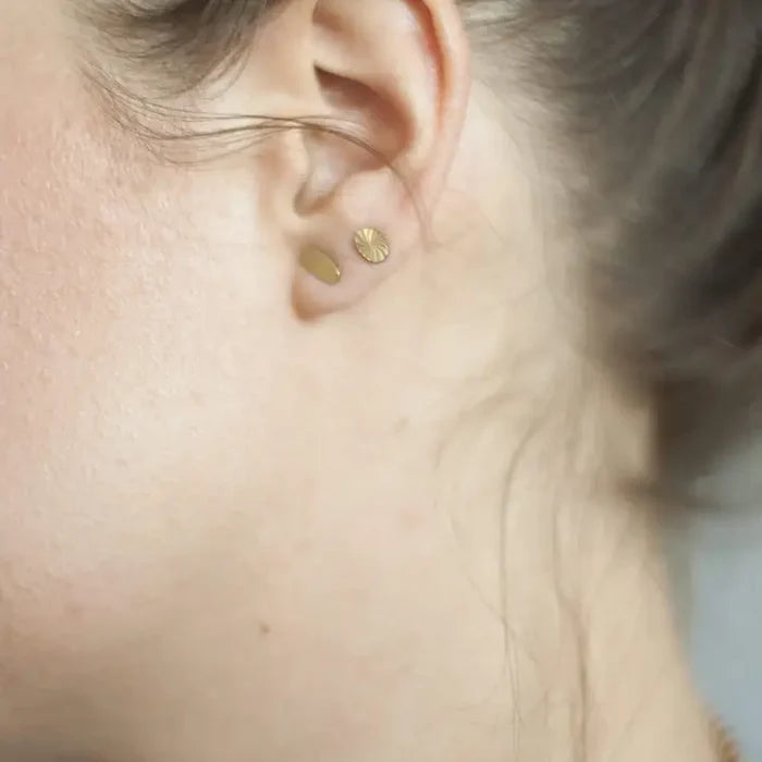 tiny starburst oval studs