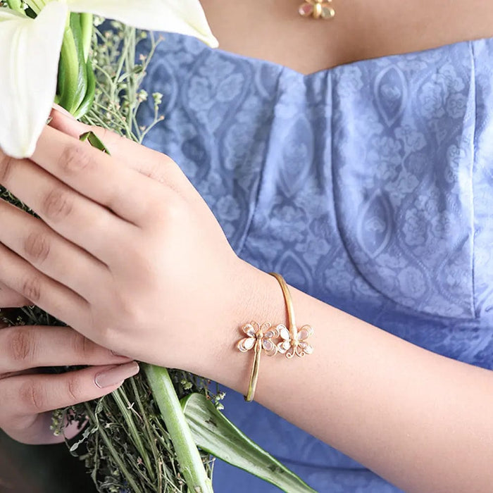 TWO BUTTERFLY MOTIF SILVER BANGLE