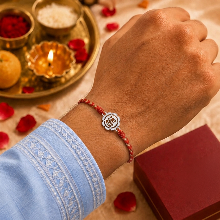 Unniyarcha 92.5 Pure Silver Ganesha Rakhi with Chandan Tilak set